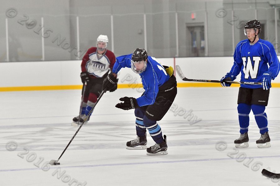 Wheaton College Men\'s Ice Hockey vs Middlesex Community College. - Photo By: KEITH NORDSTROM
